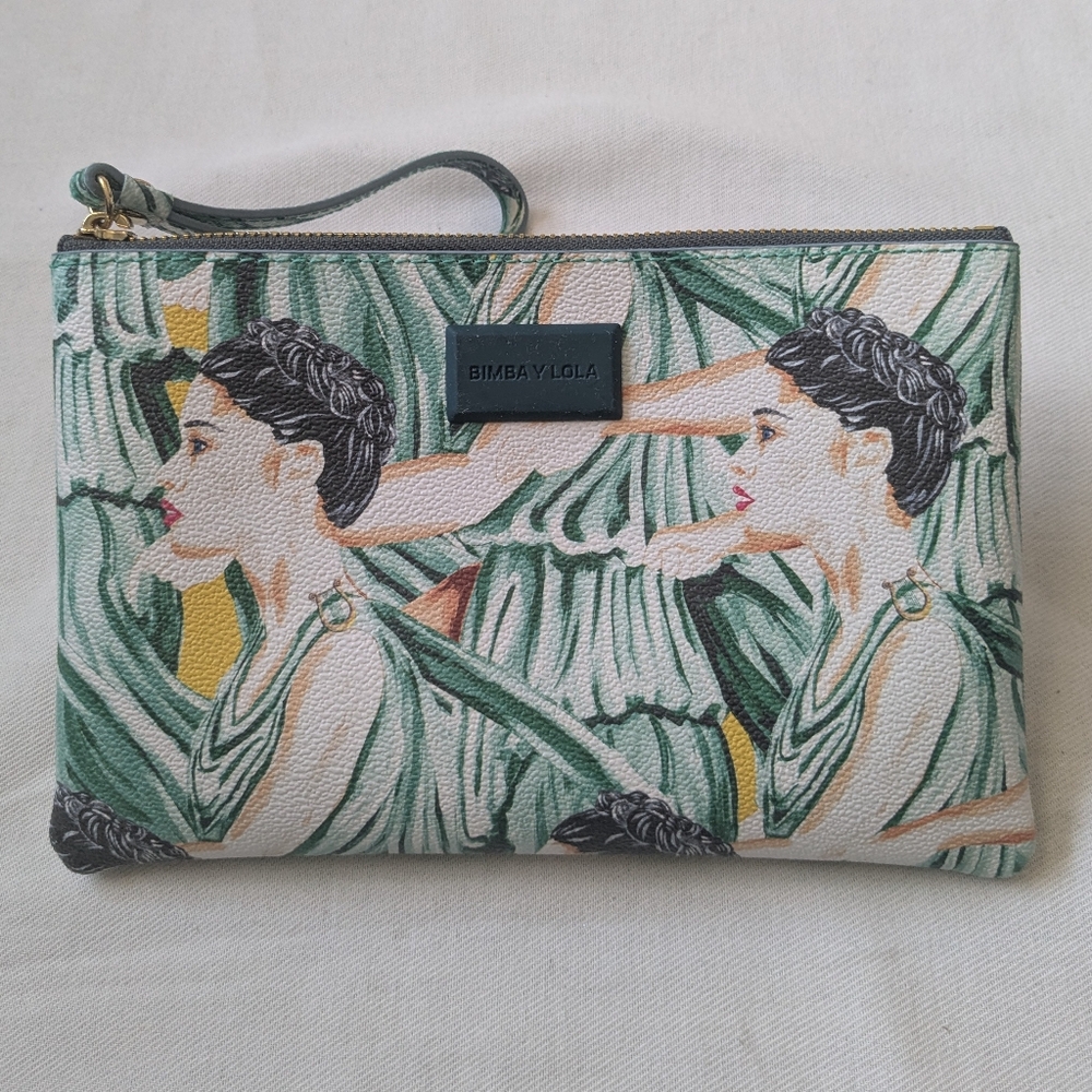 Bimba y Lola Clutch/Wristlet bag a distinctive print with stylized female figure
